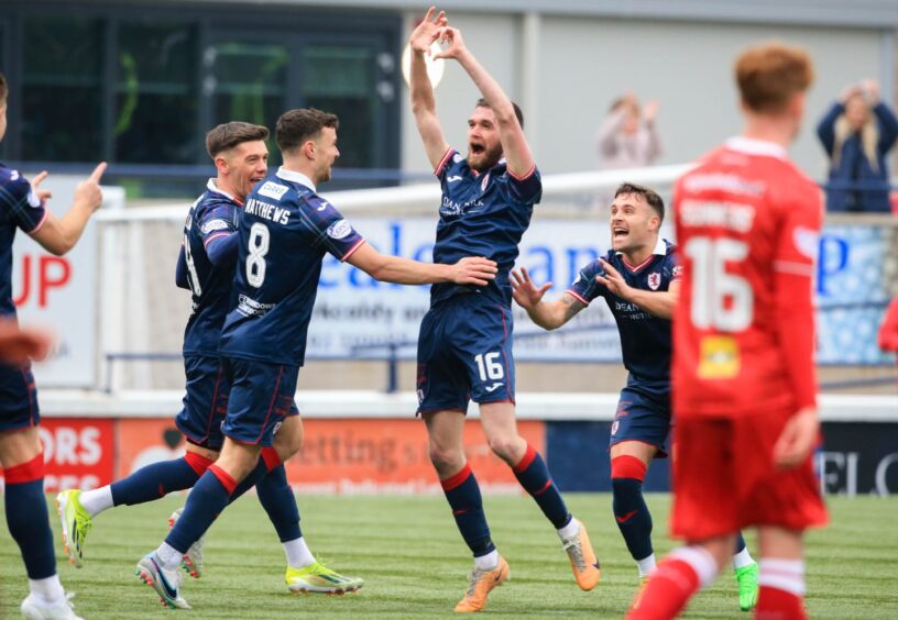 Raith Rovers hero Sam Stanton celebrates by making his hands into a love heart after scoring against Dunfermline Athletic F.C.