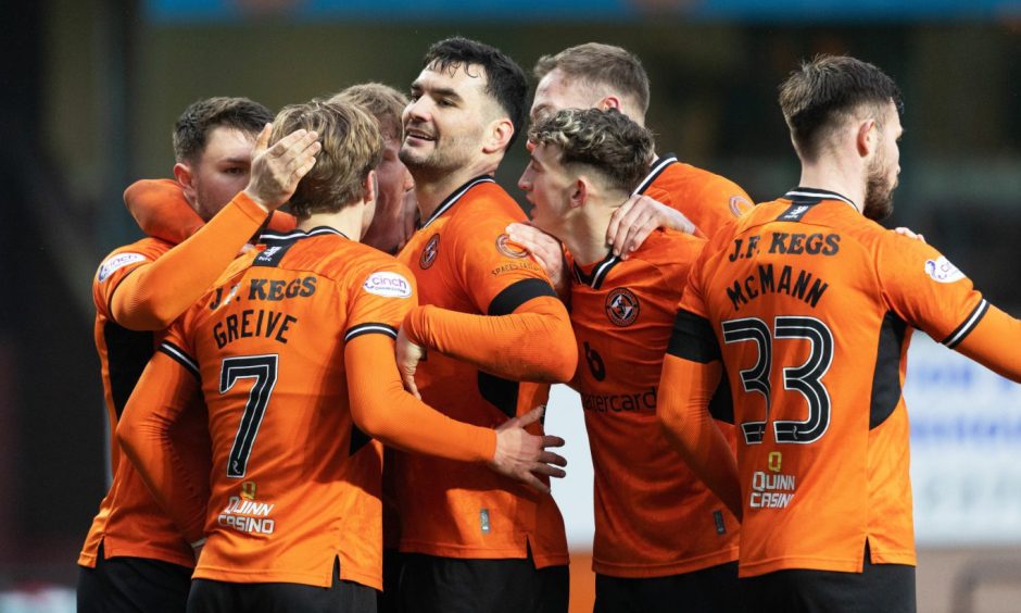 Dundee United players toast a job well done against Arbroath