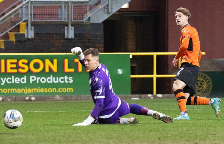 Alex Greive slams home his first goal for Dundee United