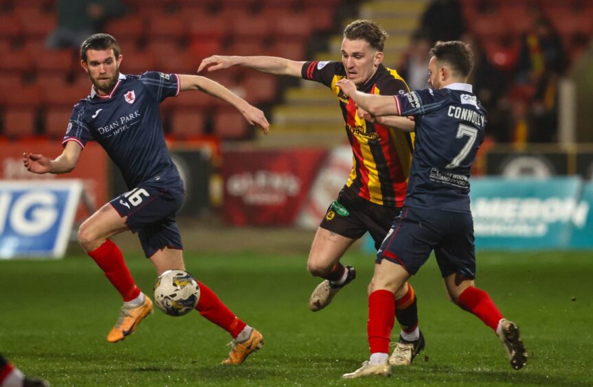 Sam Stanton and Raith Rovers team-mate Aidan Connolly team up to stifle at Partick Thistle attack.