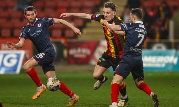 Raith Rovers duo Sam Stanton and Aidan Connolly compete with Partick Thistle defender Luke McBeth.
