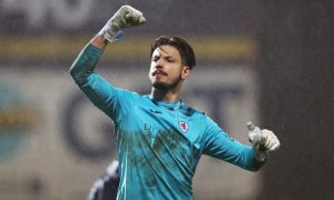 Kevin Dabrowski punches the air as he celebrates with the Raith Rovers supporters.