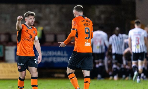 Dundee United duo Ross Docherty, left, and Louis Moult in the aftermath of a Dunfermline goal
