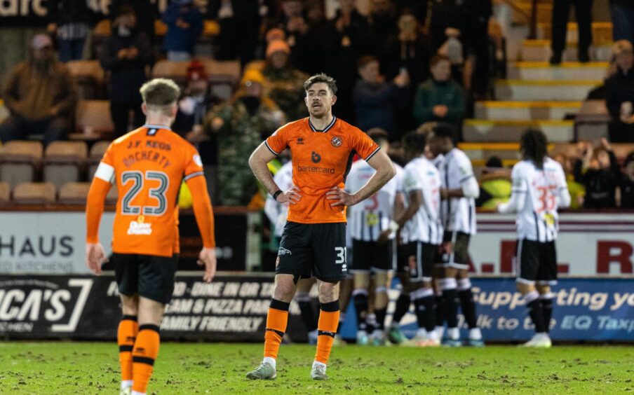 A dejected Declan Gallagher looks on as Dundee United crash. 