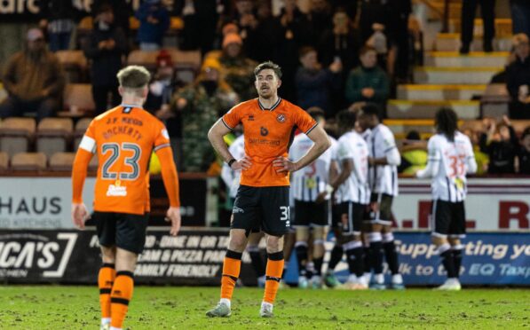 Dejected Dundee United players after defeat at Dunfermline.