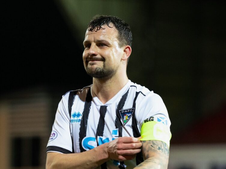 Dunfermline Athletic F.C. skipper Kyle Benedictus wearing his captain's armband.