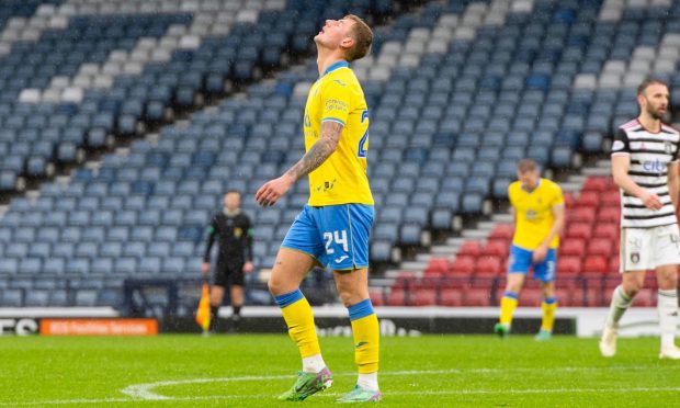 Raith's Scott McGill looks to the sky in dejection at full-time after the goalless draw with Queen's Park.