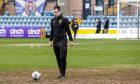 Don Robertson carries out pitch inspection at Dens ahead of Rangers game being called off. Image: Alan Harvey / SNS Group