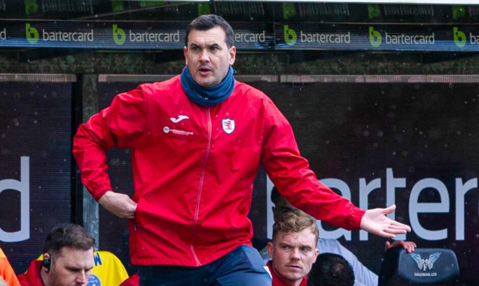 Raith Rovers manager Ian Murray holds out his left hand as he questions a decision against Dundee United.