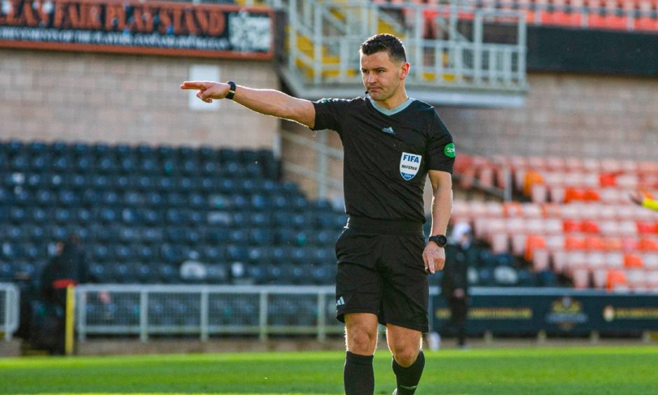 Nick Walsh points to the penalty spot