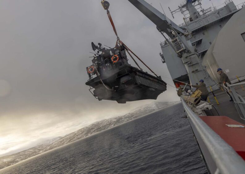 Landing craft lowering during NATO exercise.