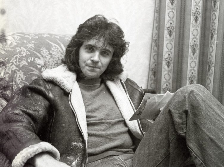 David Essex takes a seat at the Caird Hall in 1975, when he stayed at The Angus Hotel. 