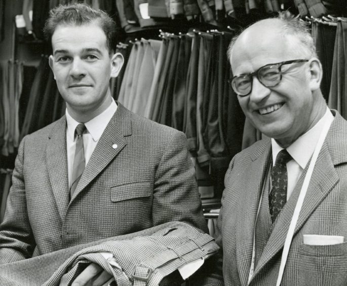 Melville Mitchell and Mr D. M. N. Mitchell in the shop in 1962.