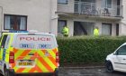 Police at Glenogil Drive, Arbroath, the day after an alleged double stabbing.