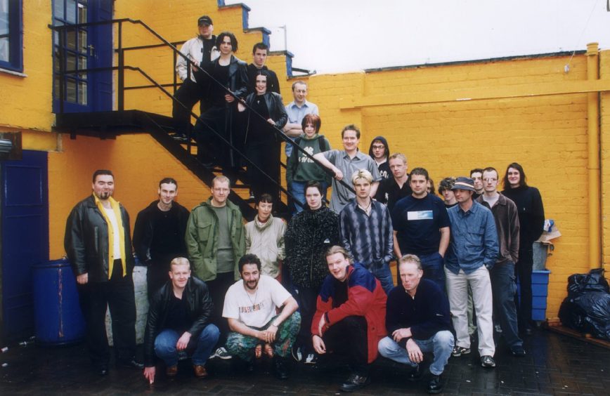 Posing for a picture outside the ice Factory are members of local bands who performed in 2000 to win a place at the T in the Park festival