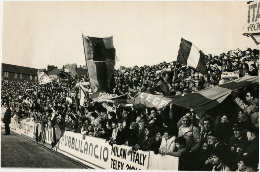 Roma supporters with banners in the away end at Tannadice in 1984. 
