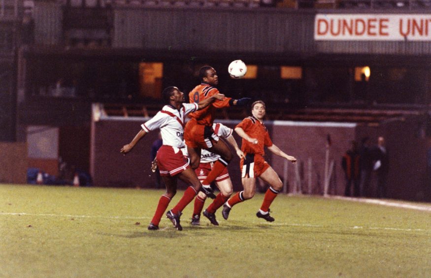 Jerren Nixon of Dundee United Jerren challenges for a ball before his injury in the 1994 game against Airdrie
