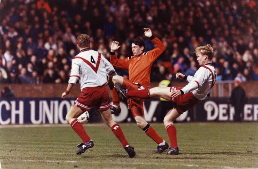 Andy McLaren races through on his way to scoring the first goal. against Airdrie in 1994.