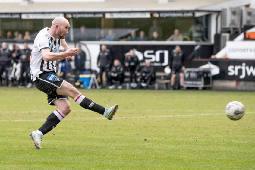 Chris Kane gets his shot away as he scores the second goal for Dunfermline Athletic F.C. against Ayr.