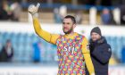 Dunfermline goalkeeper Deniz Mehmet gives the thumbs up to the Pars supporters after beating Morton.