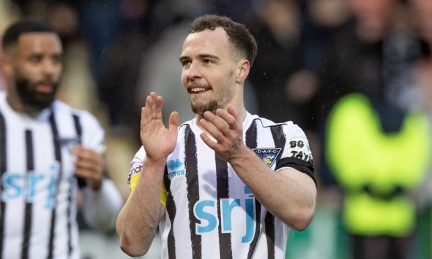 Chris Hamilton claps the Dunfermline Athletic F.C. supporters.