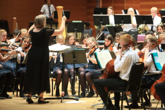 Perth Youth orchestra members at perth Concert Hall