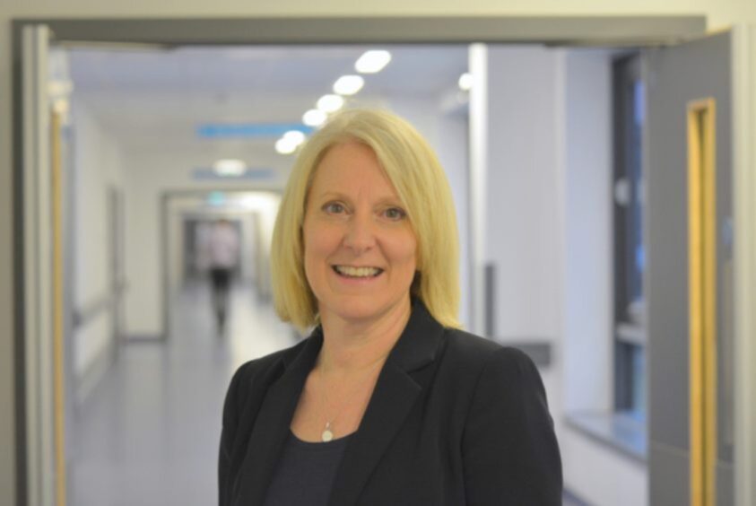 NHS Fife chief executive Carol Potter, pictured in a hospital corridor, has apologised to Jennifer Duff's family.