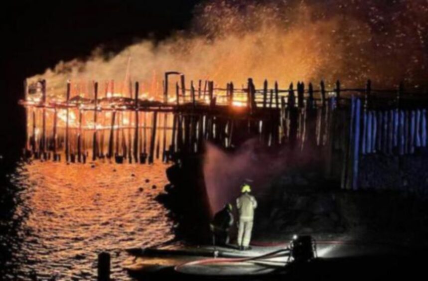 Firefighters at the scene of the June 2021 fire at the Scottish Crannog Centre.