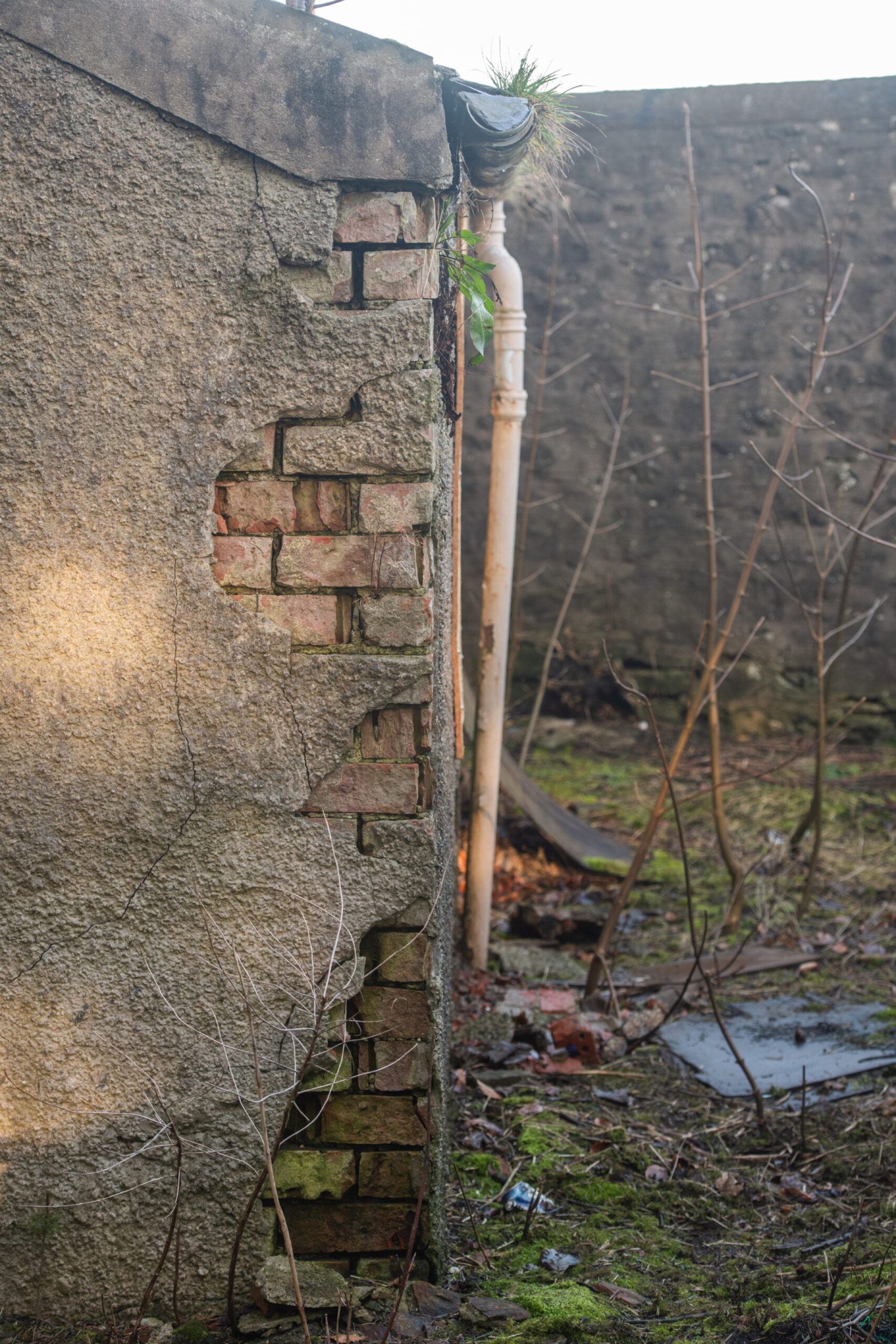 The crumbling side of the Crossroads Station building