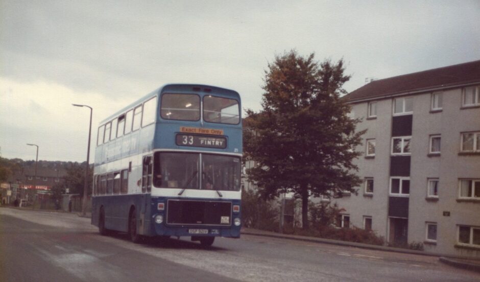 A blue Bus 21 on the Forfar Road before it was a four-lane dual carriageway. 