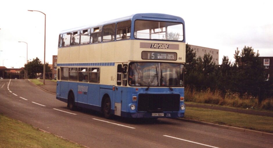 Negotiating its way on Berwick Drive is the 15 Whitfield bus, a cream and blue double decker