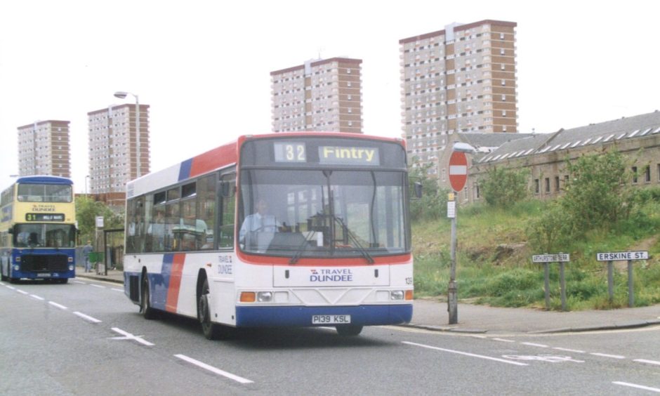 A new Travel Dundee single decker bus 139 sprints along Arthurstone Terrace in Dundee in 1997.