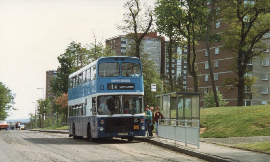 Birkdale Place being re-laid as bus 140 picks up its passengers. 