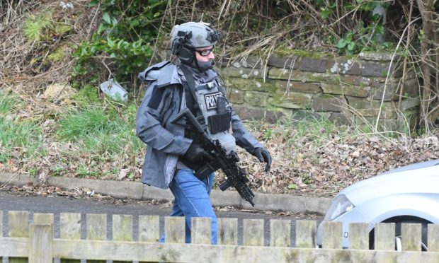 Armed police in Tulloch Hill