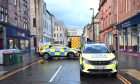 Police and ambulance present in King Edward Street in Perth. Image: Stuart Cowper.