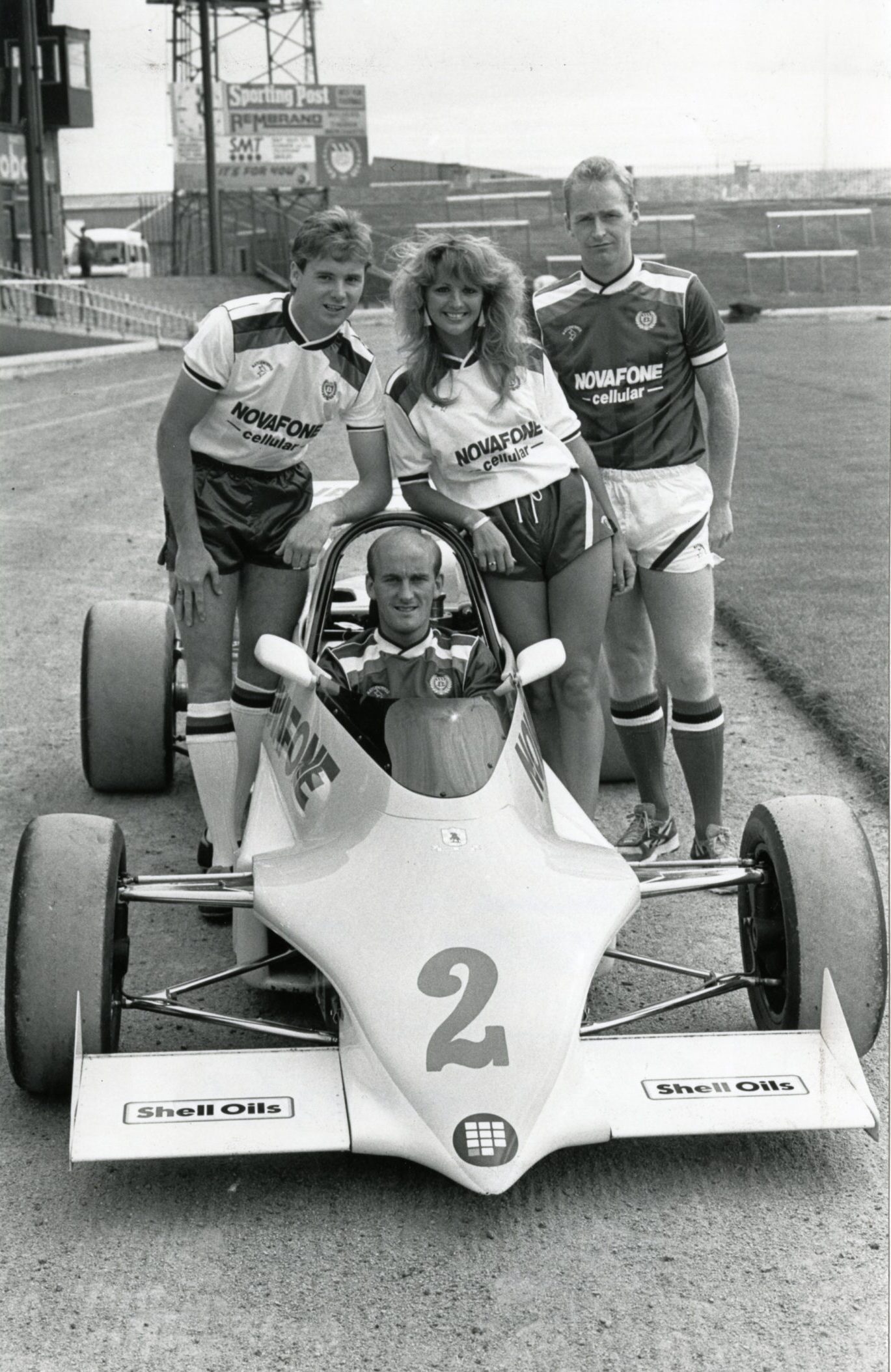Tommy Coyne, Jim Duffy and John Brown (sitting in a go-kart) at the launch of new Dundee FC strips in 1987. Image: DC Thomson.