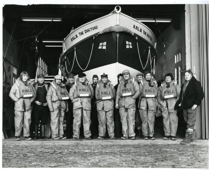 The launchers and crew of the RNLB The Doctors lifeboat at Anstruther on January 11, 1978.