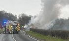 Crews at the scene of a van fire on the A907 near Blairhall in Fife
