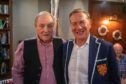Fraser Bruce smiling next to Michael Portillo in Perth's Old Ship Inn