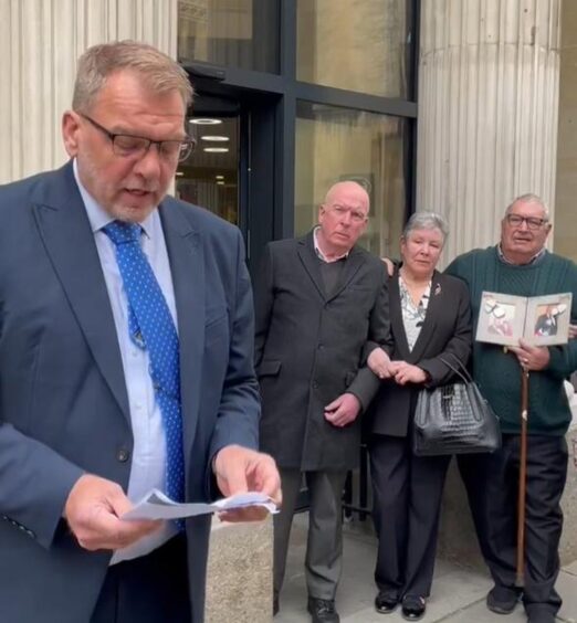 DS Gary Haskins reads a statement from Frederick Burge's family at Bristol Crown Court.