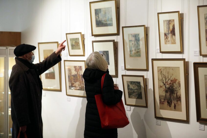 Visitors enjoying an exhibition at the Meffan Museum.