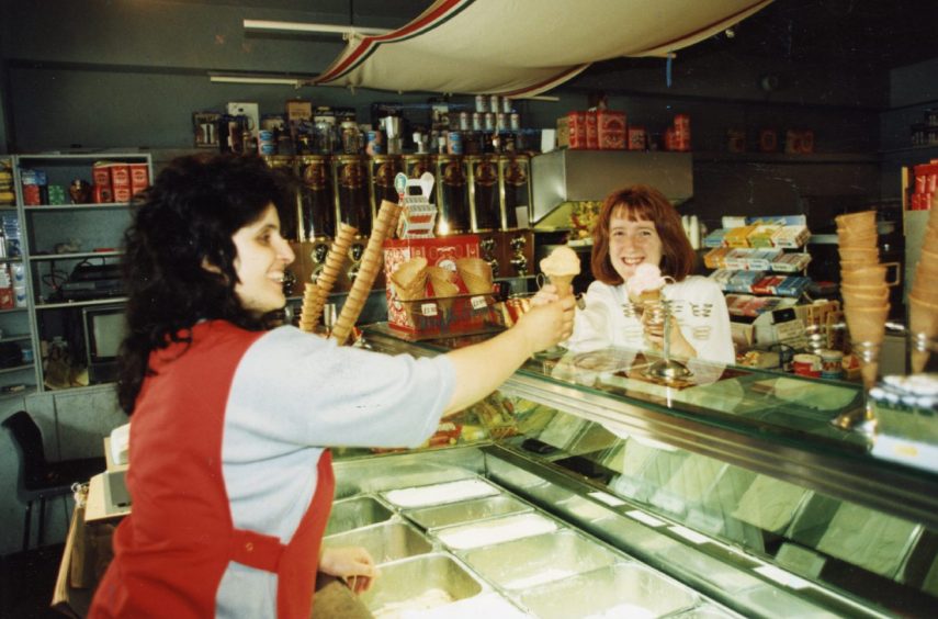 A happy customer served up a cone in August 1995.