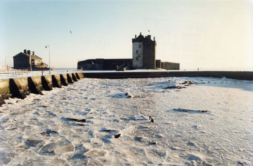 Ice at Broughty Ferry harbour, with the castle in the background