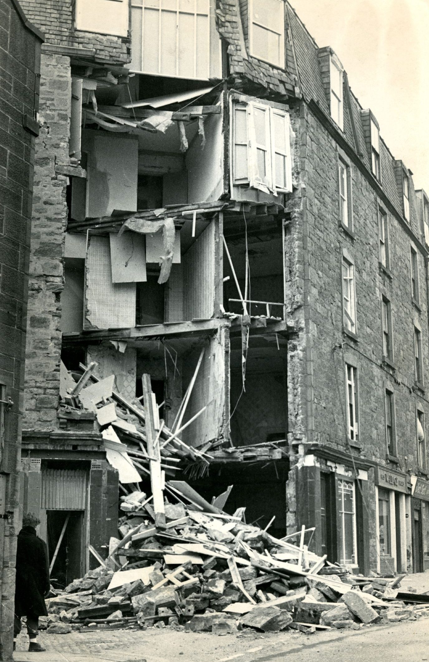 A man looks on after the tenement collapse on Blackness Road in Dundee in 1984