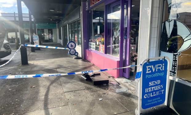 Money and a cash register were dumped outside MS News in Barnhill. Image: Ellidh Aitken/DC Thomson