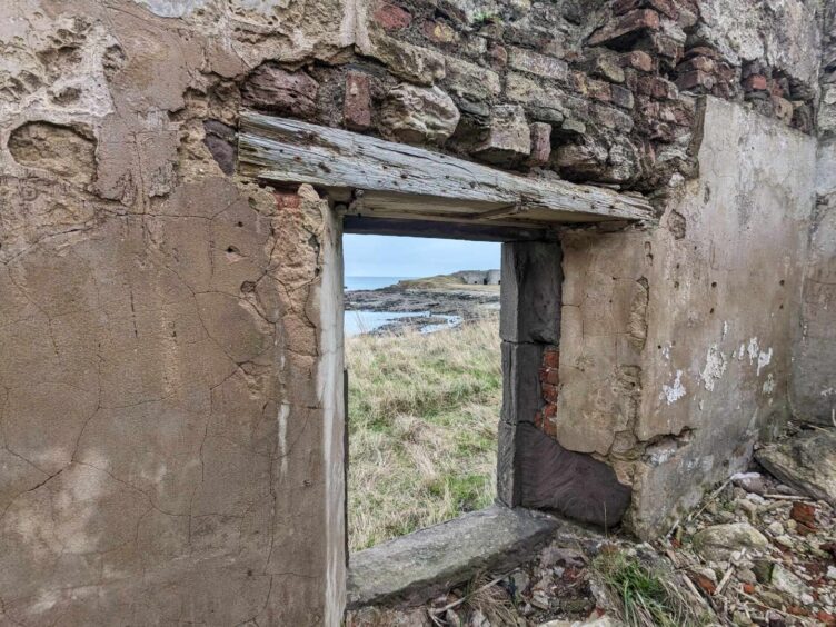 View from inside one of the ruined terraced houses belonging to the salmon fishing station at Boddin.