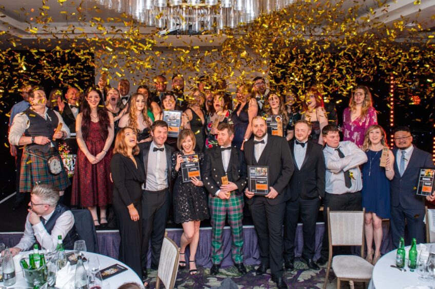 The Courier Food and Drink Awards winners for 2024 pose for a group picture as confetti falls