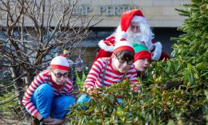 The Where's Santa team hide in the bushes outside HMP Perth.  Image: Kim Cessford / DC Thomson