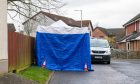 A blue forensics tent has been put up on Newhouse Place in Perth. Image: Kim Cessford/DC Thomson