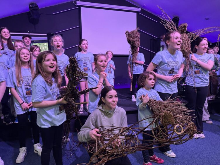 Young people from Rubber Chicken Theatre rehearsing with willow animals